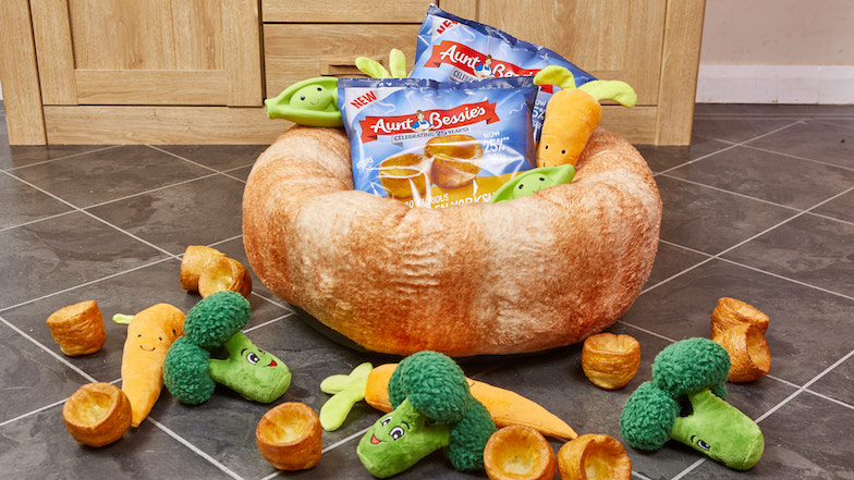 Aunt Bessie's Yorkshire pudding dog bed with packets of Yorkshire puddings and vegetable toys
