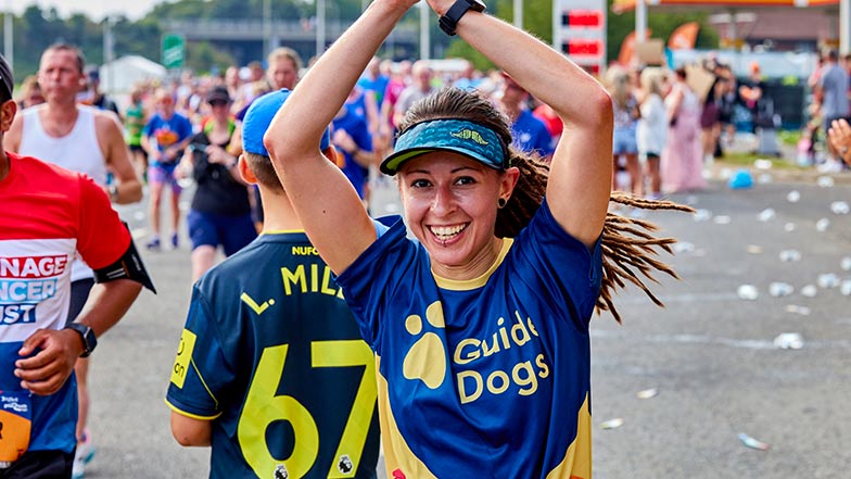 Woman wearing Guide Dogs t-shirt at Great North Run