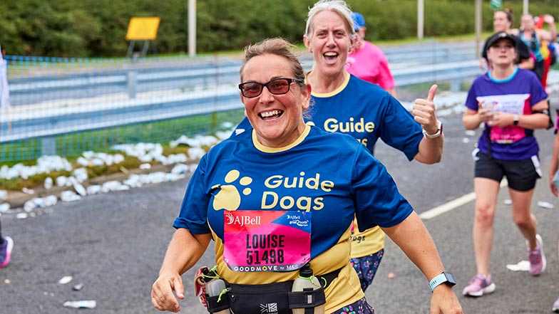 Runners wearing Guide Dogs t-shirts