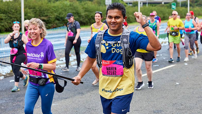 Runner wearing a Guide Dogs t-shirt