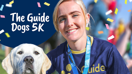 A woman in a Guide Dogs t-shirt with a guide dog and the writing "The Guide Dogs 5k" in the top left corner