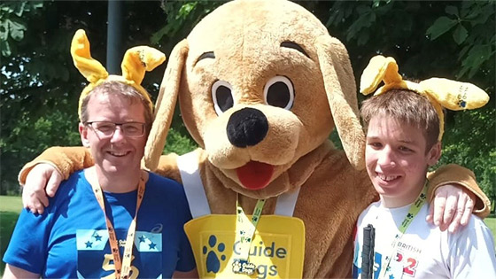 Murray and Stewart with Guide Dogs mascot at the Guide Dogs Run