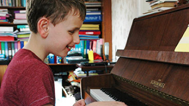 Declan playing the piano