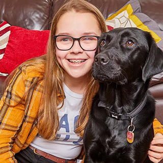 Caitlin and her guide dog Honey 