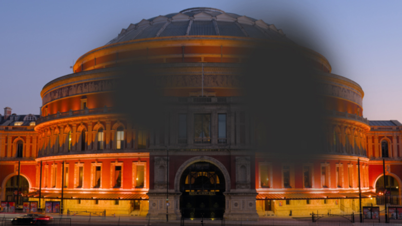 Royal Albert Hall lit up at night as seen by someone with macular degeneration