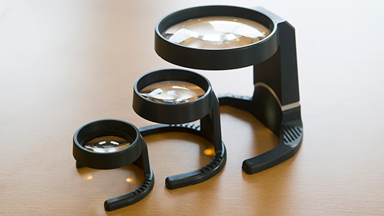 Three different strength and size illuminated stand magnifiers