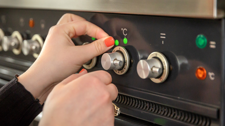An image of a green bump-on marking the temperature settings on an oven