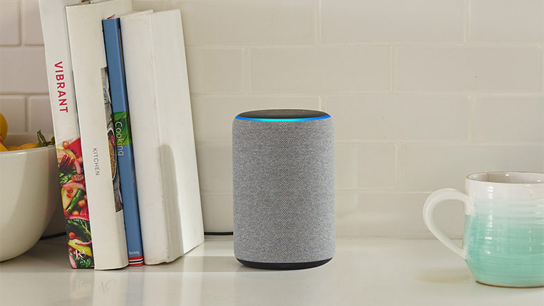 An Amazon Echo device on a kitchen counter