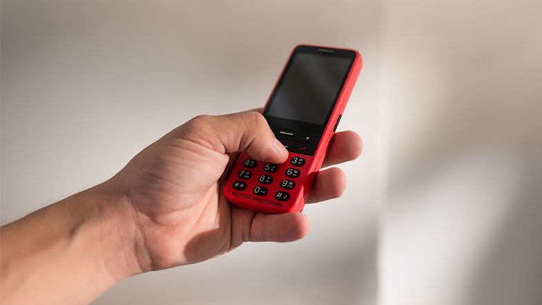 Image of a hand holding the Blindshell classic two phone